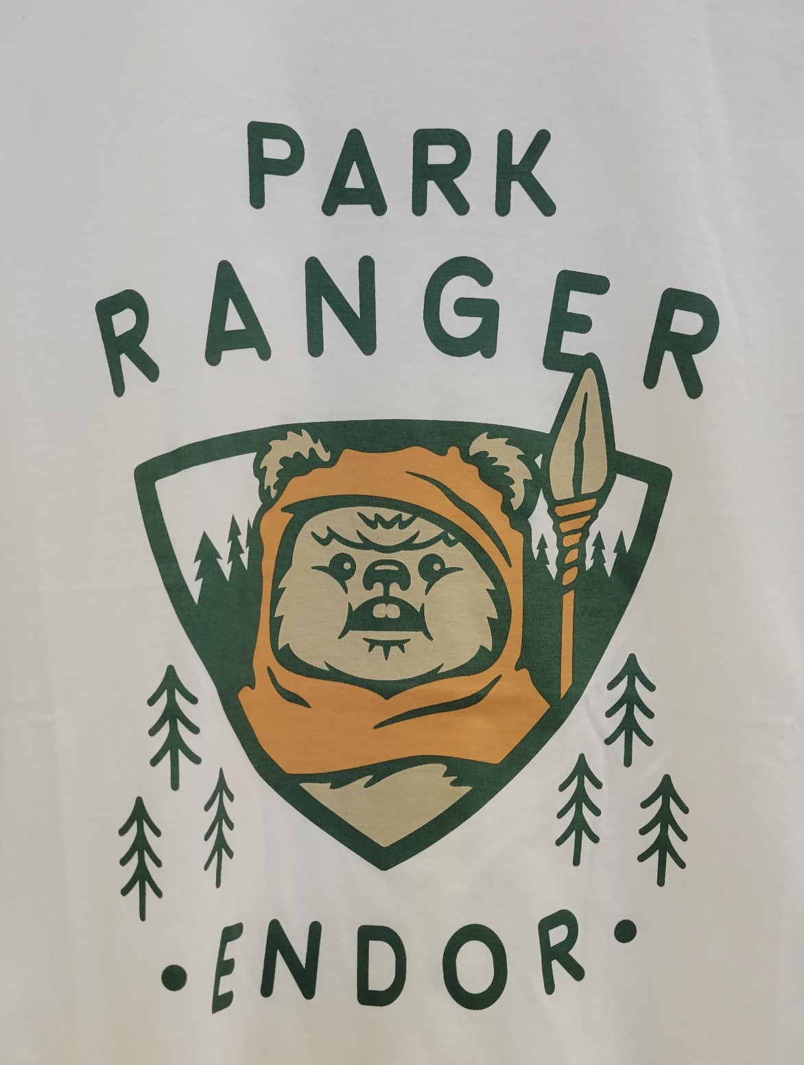 A picture of an Ewok from Star Wars. The caption around the image says "Park Ranger Endor".